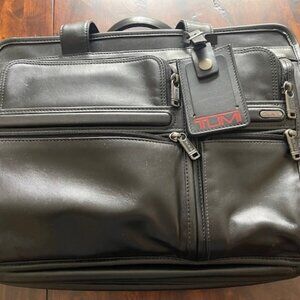 Tumi black leather briefcase